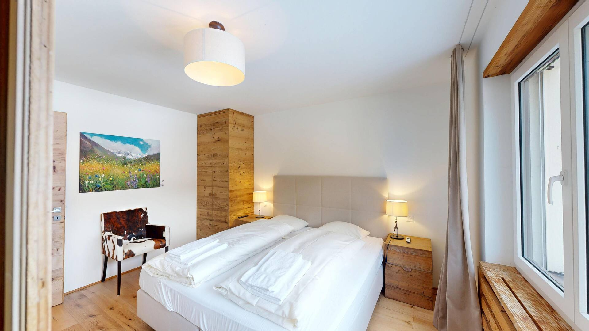 Curated artwork in a serviced apartment interior