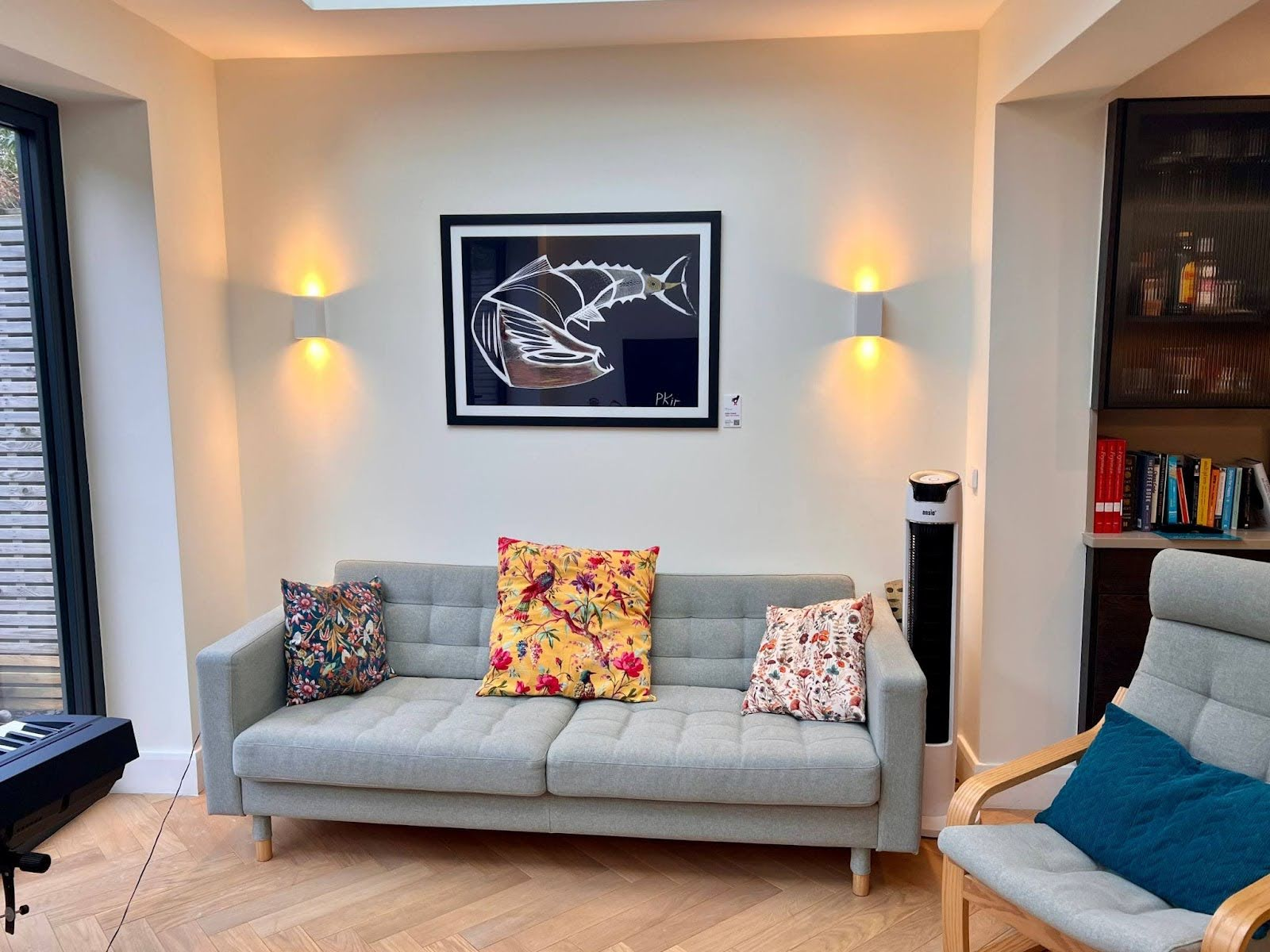 Original art displayed in a stylish Airbnb interior