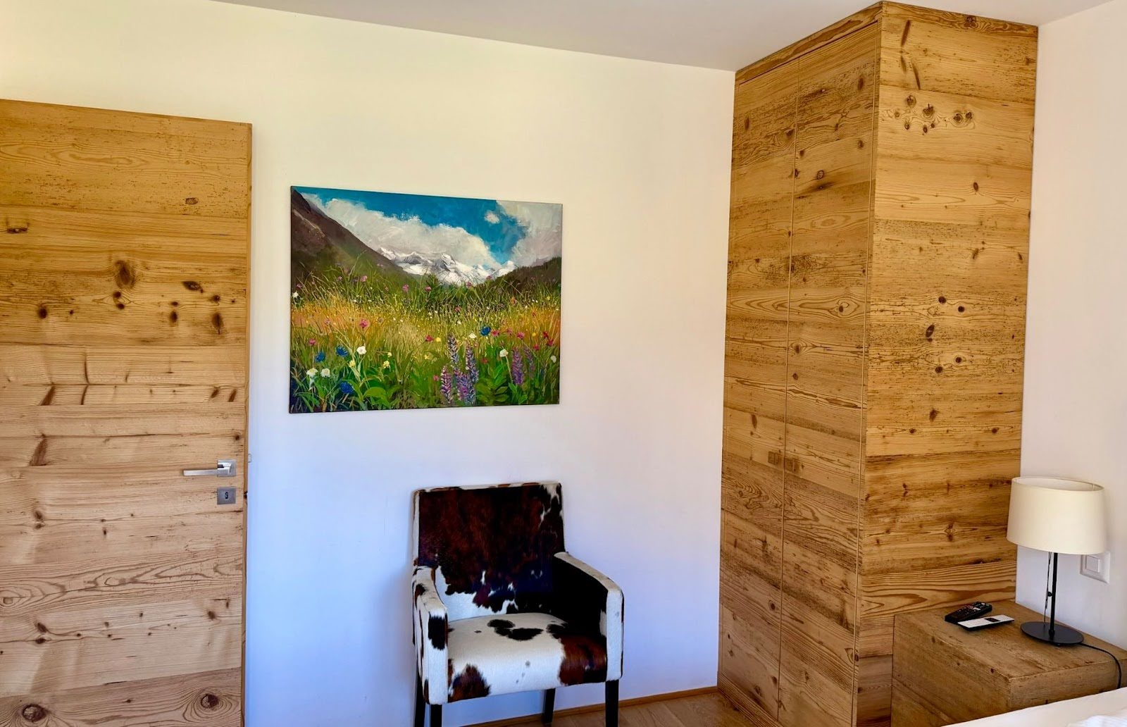 Curated art on an Airbnb wall