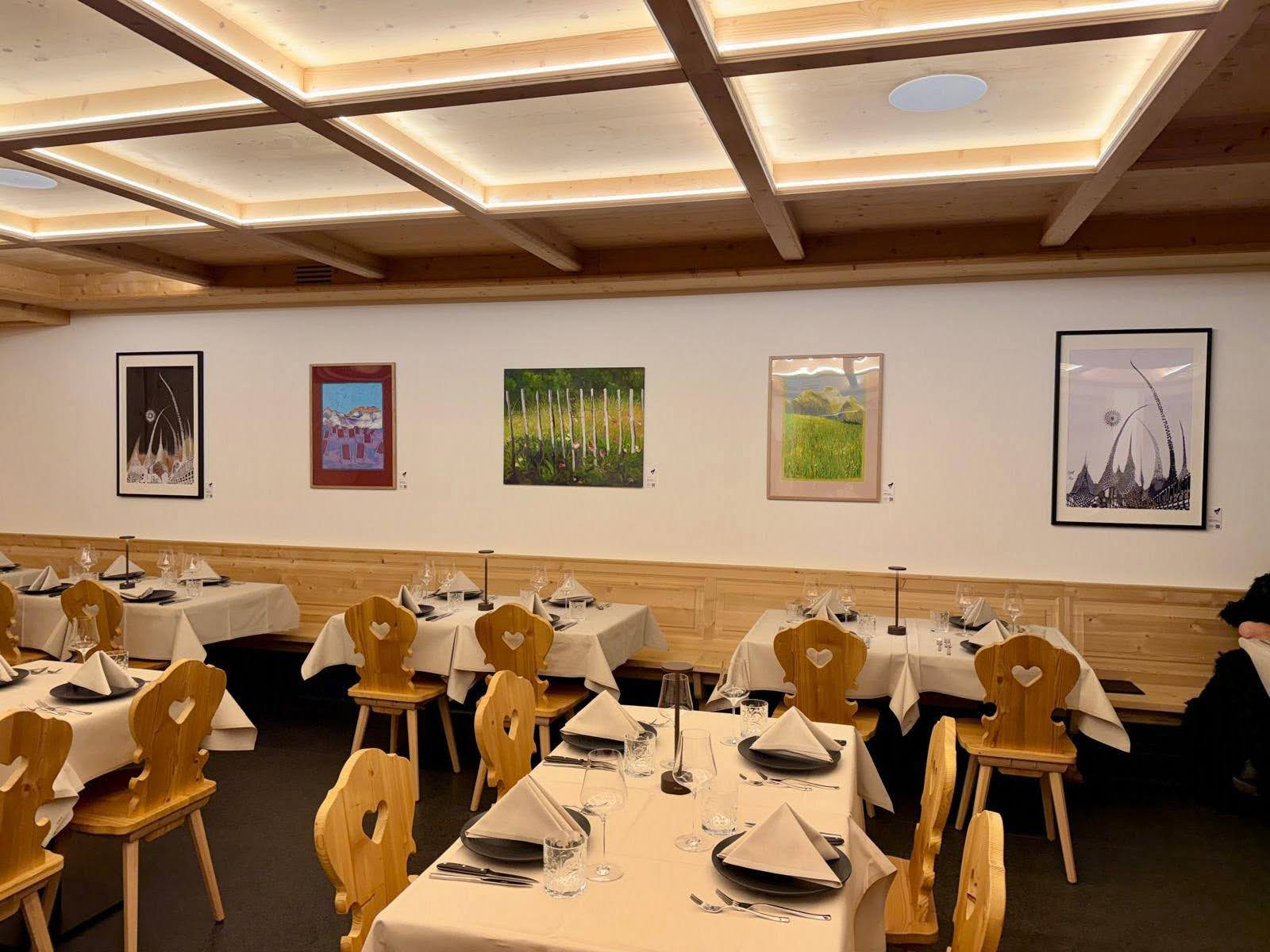 Original artwork displayed on a hospitality venue wall without upfront cost