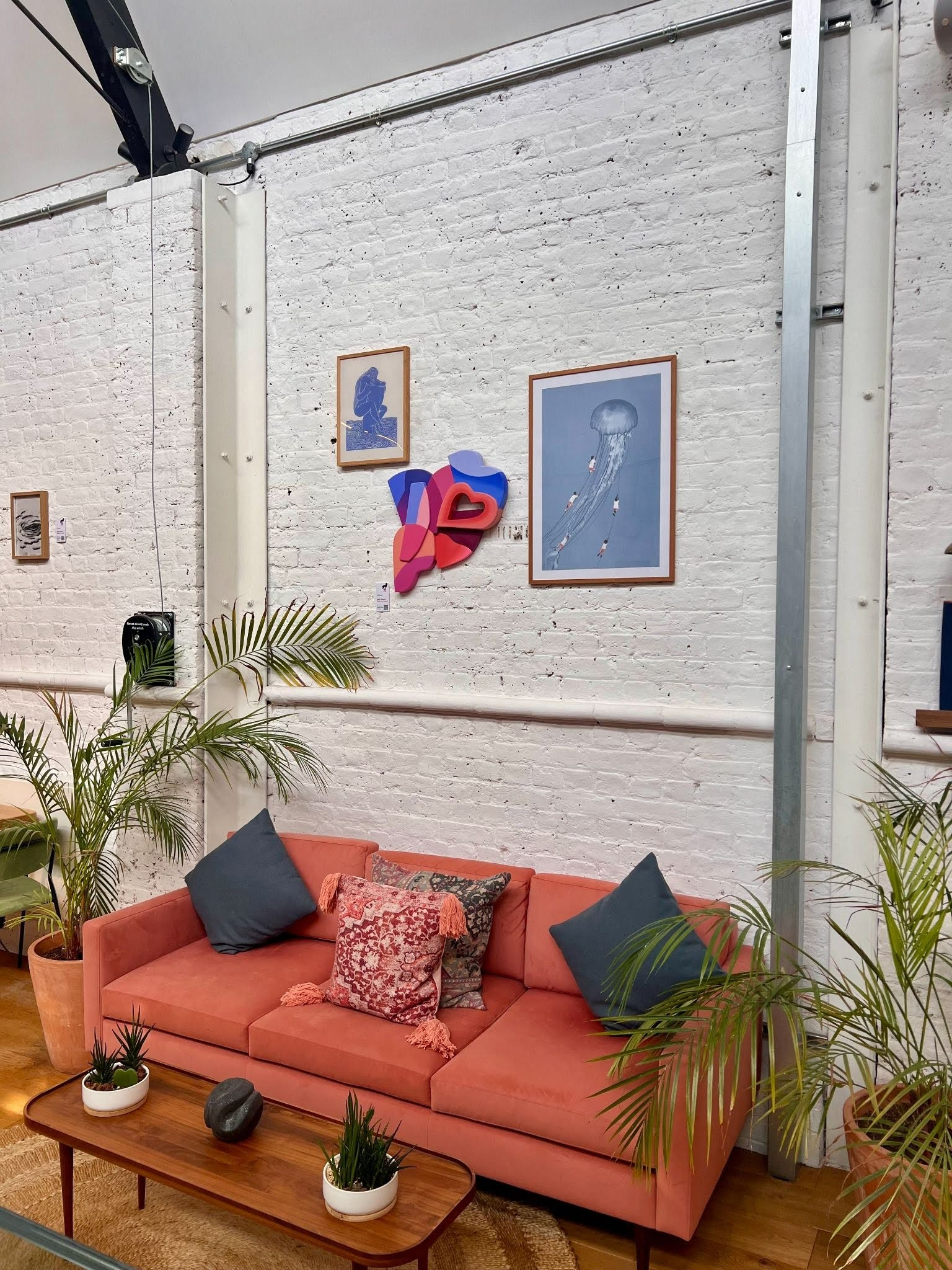 Artwork displayed in a non-gallery hospitality setting