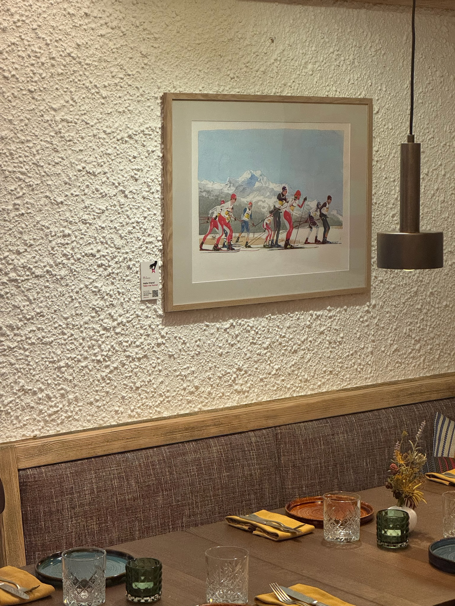 A QR code label placed discreetly next to an artwork